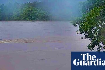 Queensland and NT warned to prepare for major flooding as tropical lows bring deluge | Australia weather