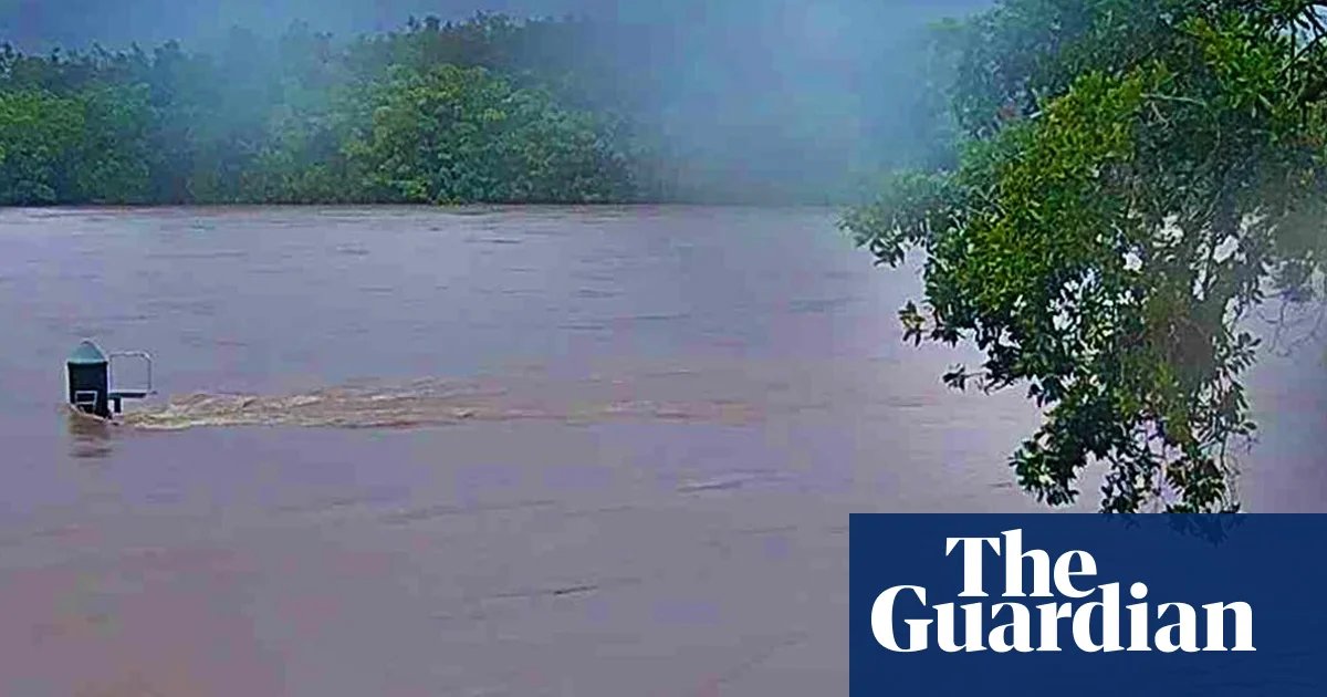 Queensland and NT warned to prepare for major flooding as tropical lows bring deluge | Australia weather