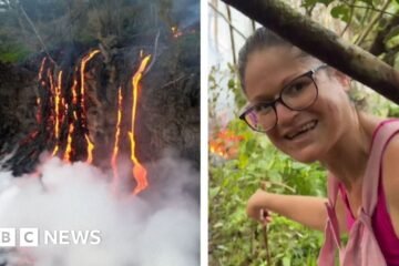 Woman is steps away from lava as volcano erupts on Reunion Island