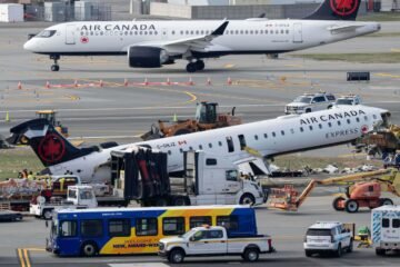 Mangled plane in LaGuardia crash is towed from runway as most injured passengers leave hospital