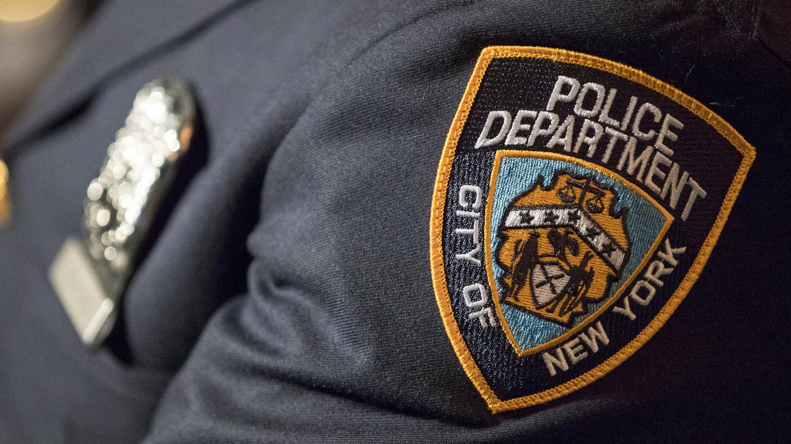 NYPD says officer who guards mayor’s home is suspended after shooting a man while off duty