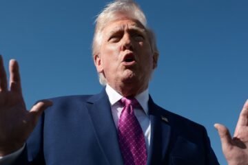 Trump Truth Social post threatens Iran with AI picture of himself with gun