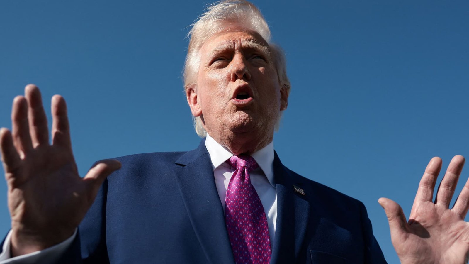 Trump Truth Social post threatens Iran with AI picture of himself with gun