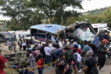 Explosive device kills 20 and injures dozens on a bus in southwestern Colombia as violence persists