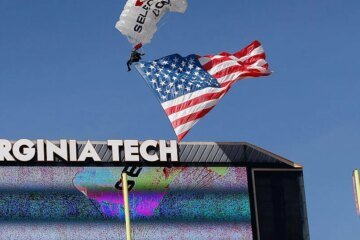Skydiver rescued after crashing into scoreboard during Virginia Tech football scrimmage