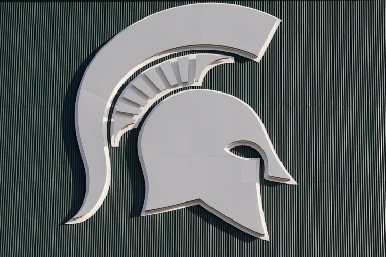 Man charged with possessing meth lab chemicals in Michigan State building