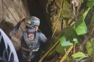 Man rescued after more than a week trapped in flooded cave in Laos