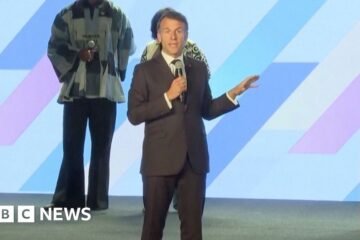 Emmanuel Macron interrupts speaker to ask for silence