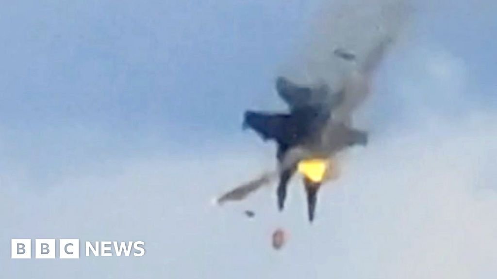 Moment two fighter jets collide mid-air during US air show