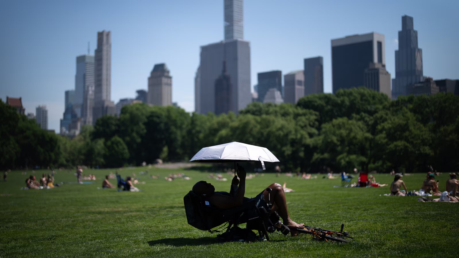 Eastern US sweats through another hot day before rain, cold move in